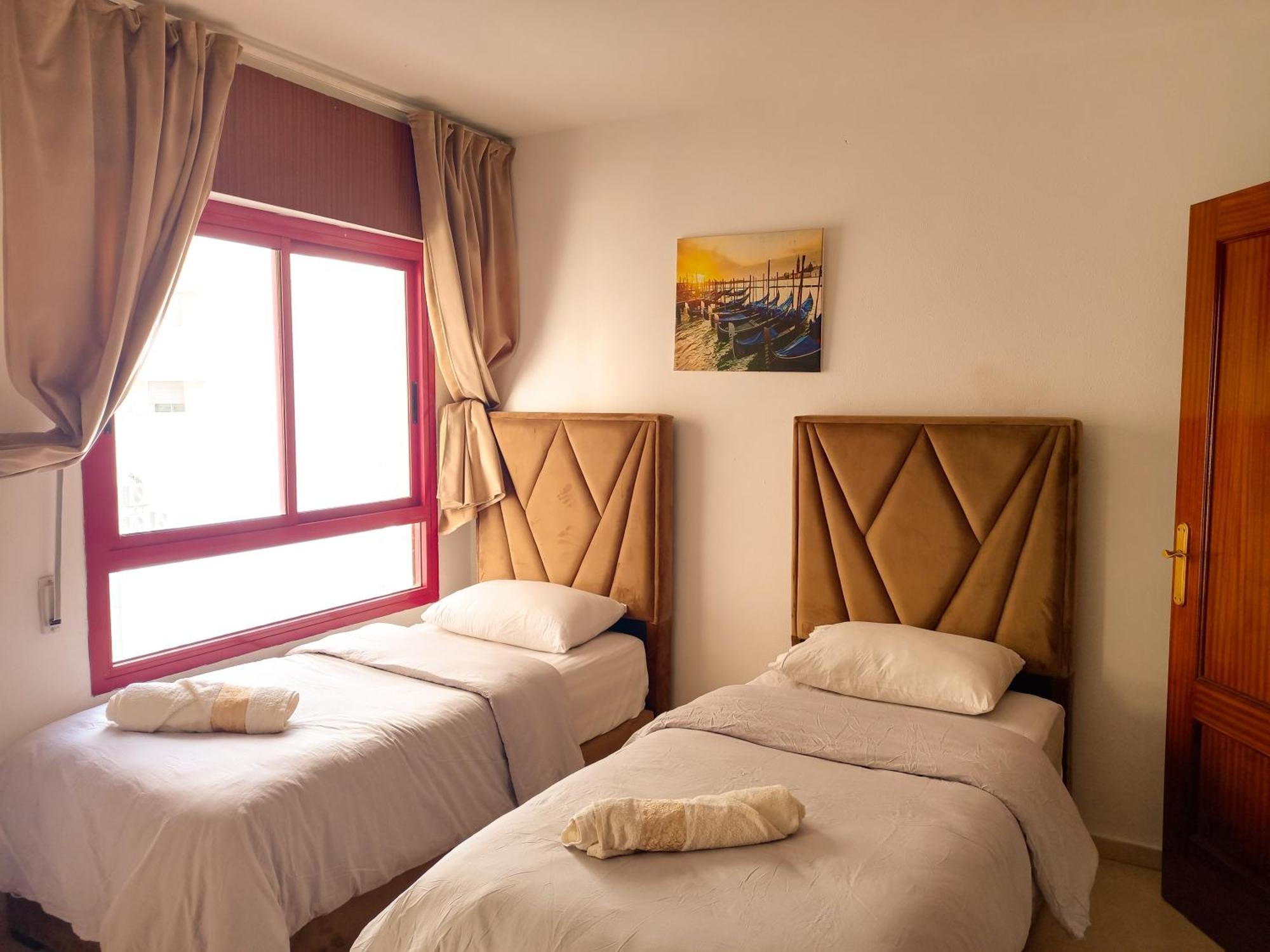 Amazing Appartement " Avec Climatisation " Au Centre Ville En Face Hilton & Gare Train De Tgv De Tanger 2N Extérieur photo